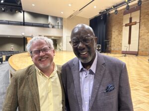 To men standing together